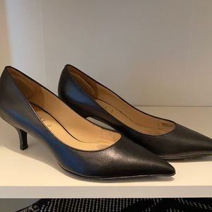 Cole Haan black low pump.  NIKE air collab